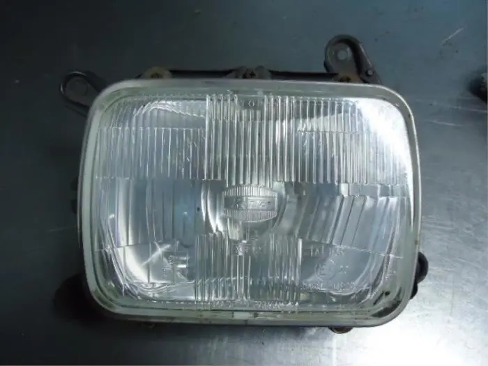 Headlight, right Nissan Patrol