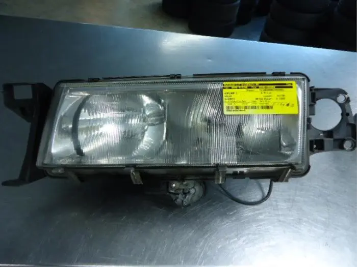 Headlight, left Volvo 9-Serie