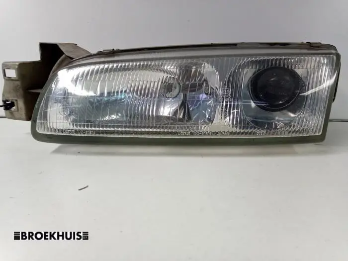 Reflektor lewy Mazda 626