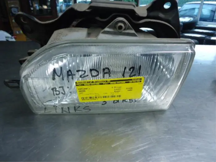 Koplamp links Mazda 121