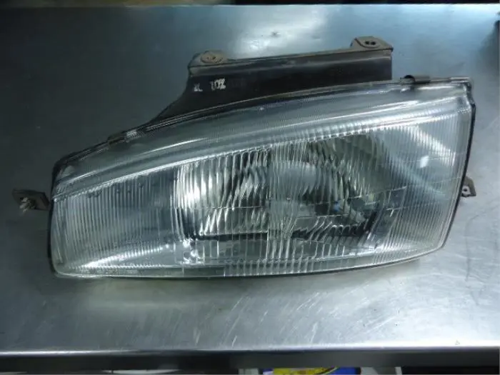 Headlight, left Hyundai Lantra