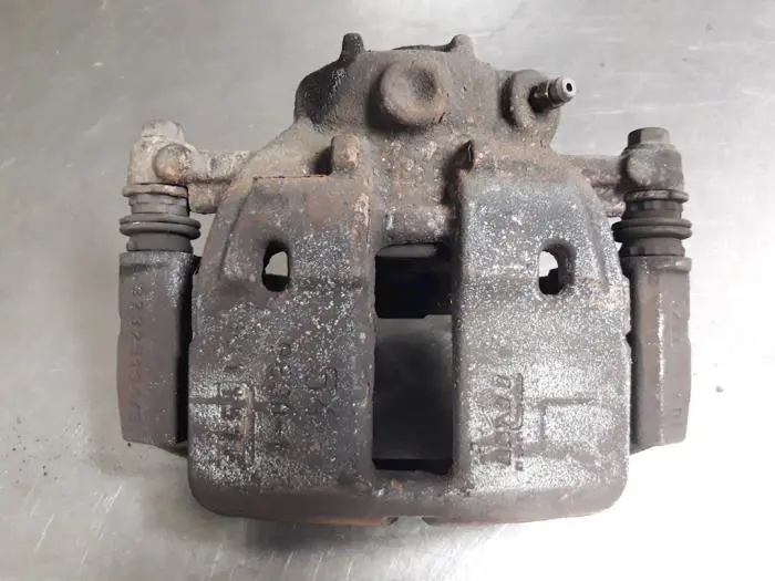 Front brake calliper, left Mitsubishi Colt