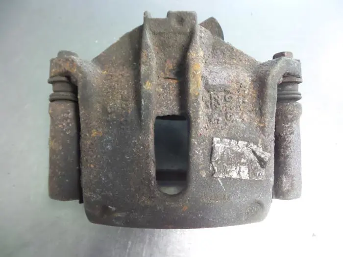 Front brake calliper, left Citroen Xsara Picasso