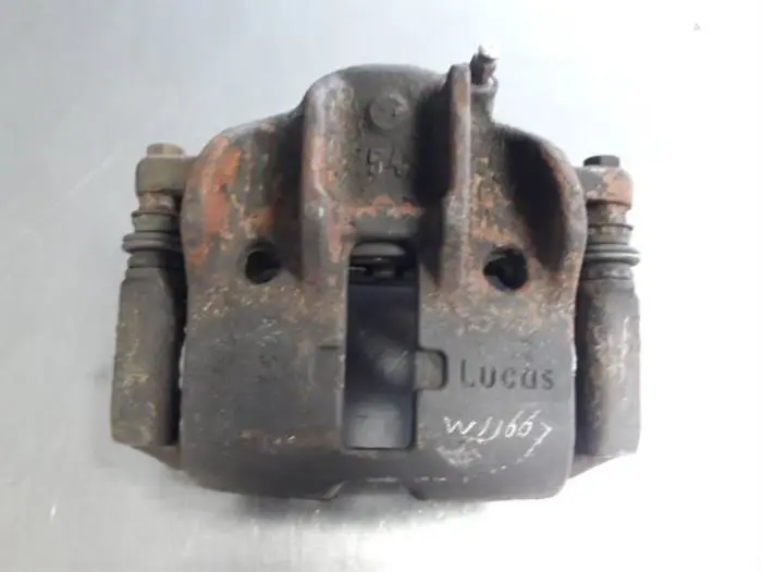 Front brake calliper, left Peugeot 306