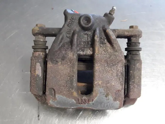 Front brake calliper, left Renault Modus