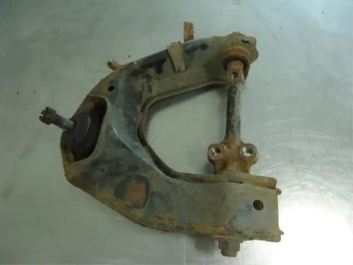 Front upper wishbone, right Toyota Hilux