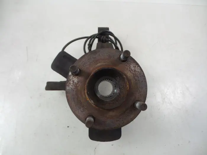 Knuckle, front right Nissan NV200